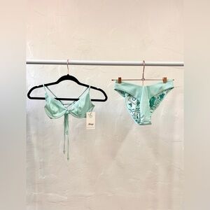 Medium Maaji women’s reversible bikini top and bottom.